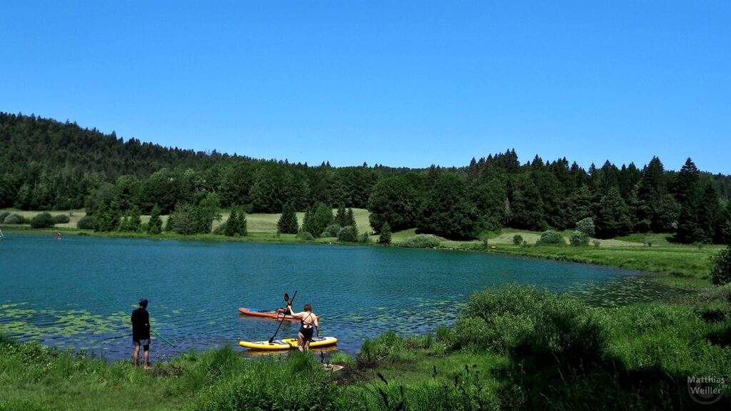 Lac Genin mit Paddlern