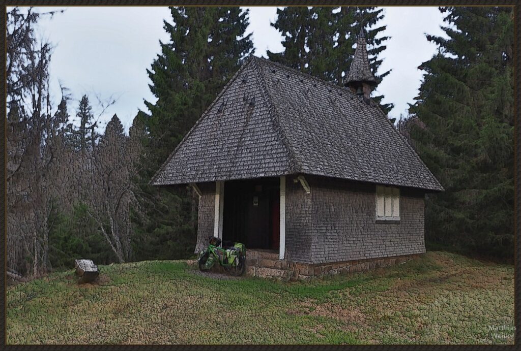 stilisiertes Foto der Kapelle Todtnauer Hütte mit Reiserad